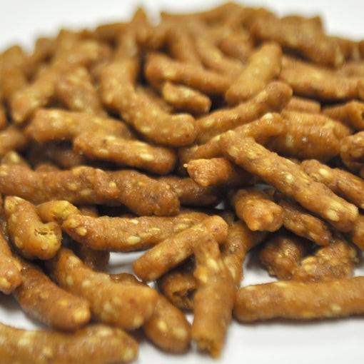 Palitos de sésamo tostados con miel District Snacks - 1/1 ct c/u